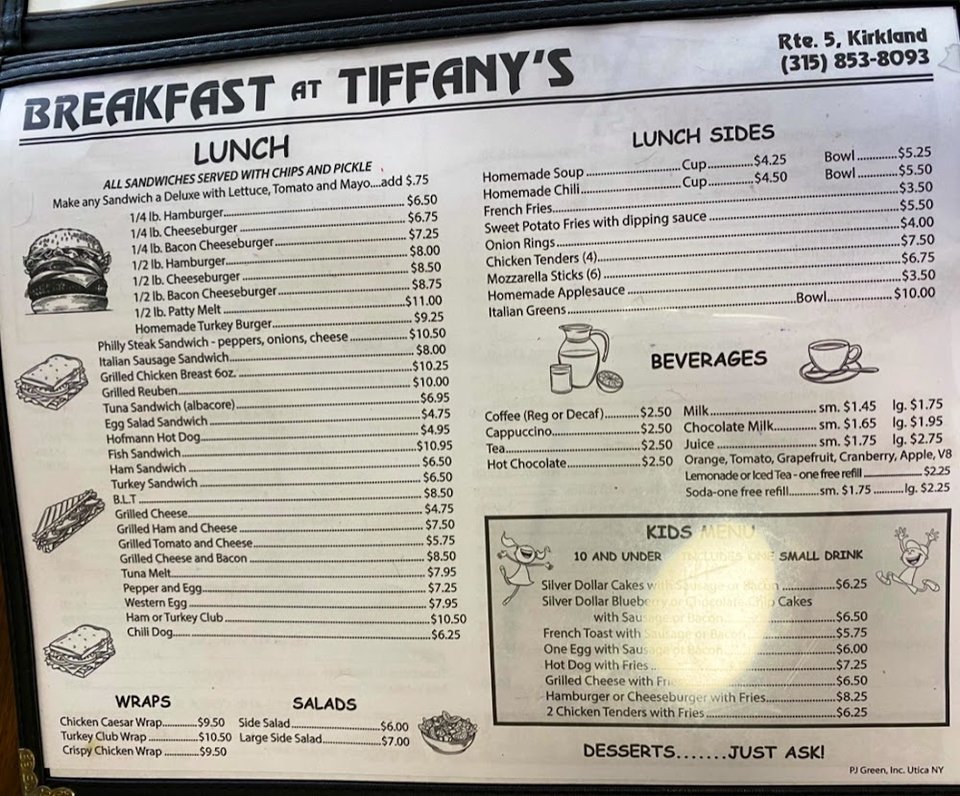 Coffee and tea beside a breakfast menu.